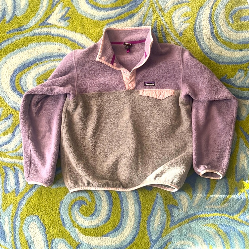 A purple and gray Patagonia fleece